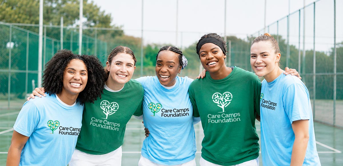 Group of women in Care Camps Foundation tshirts